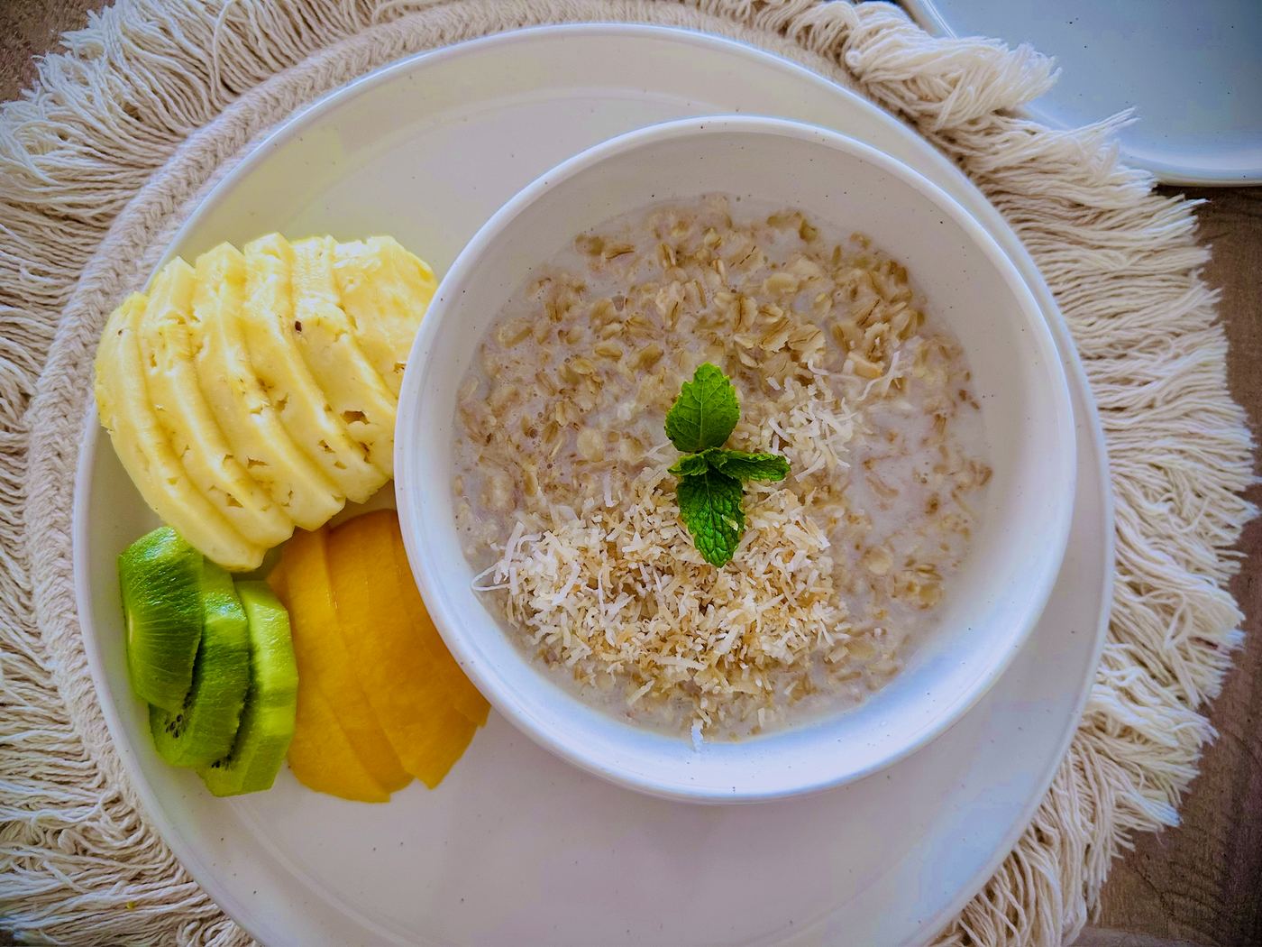 Breakfast, included daily: oatmeal with coconut, pineapple, kiwi and mango from the villa's chef