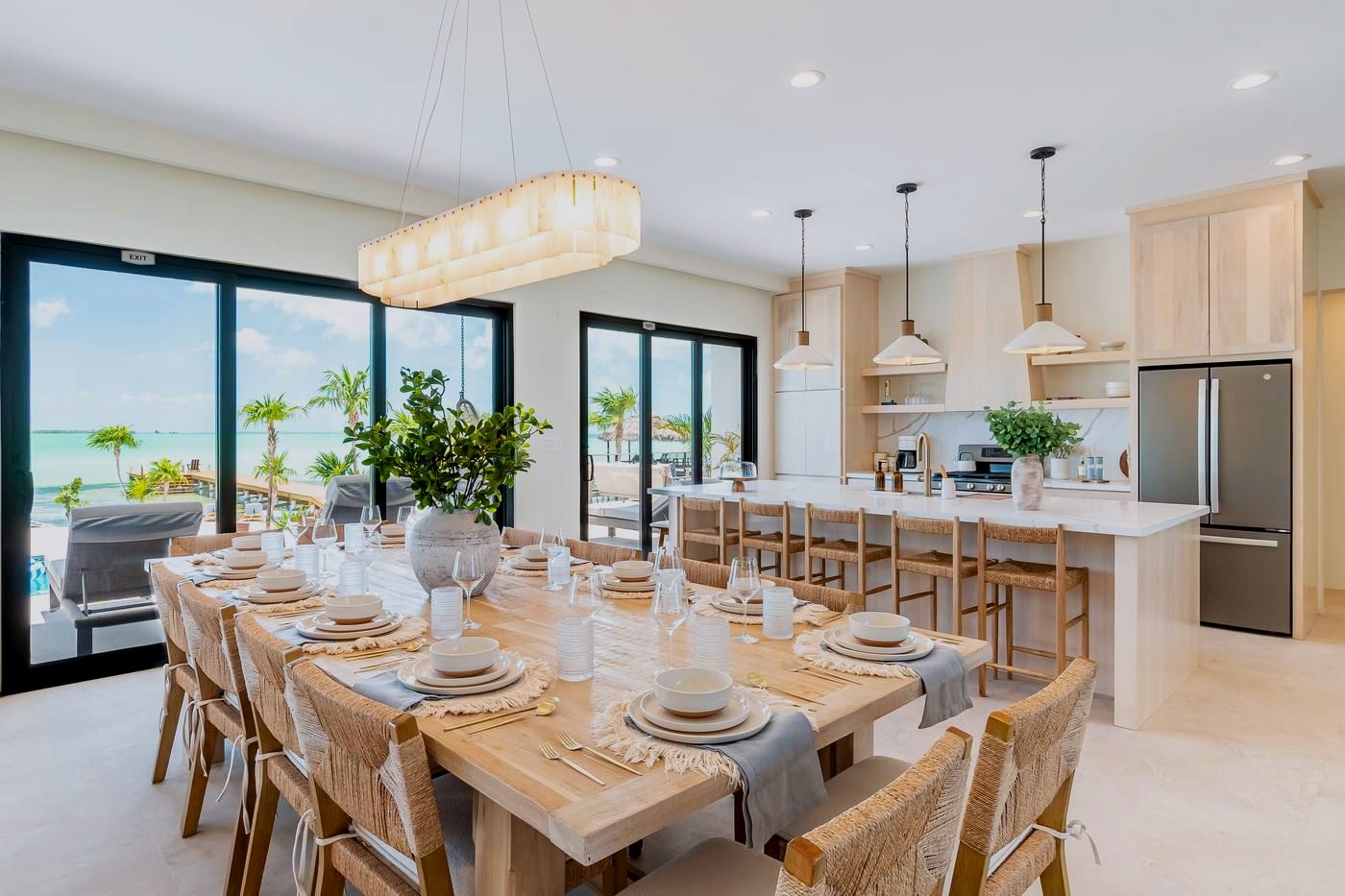 The chef's table set for dinner beside the open kitchen