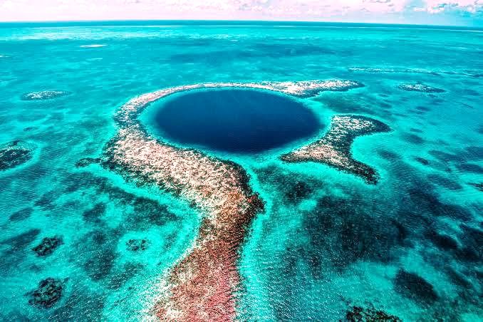 Aerial view of the Great Blue Hole, Belize, a day trip from the villa