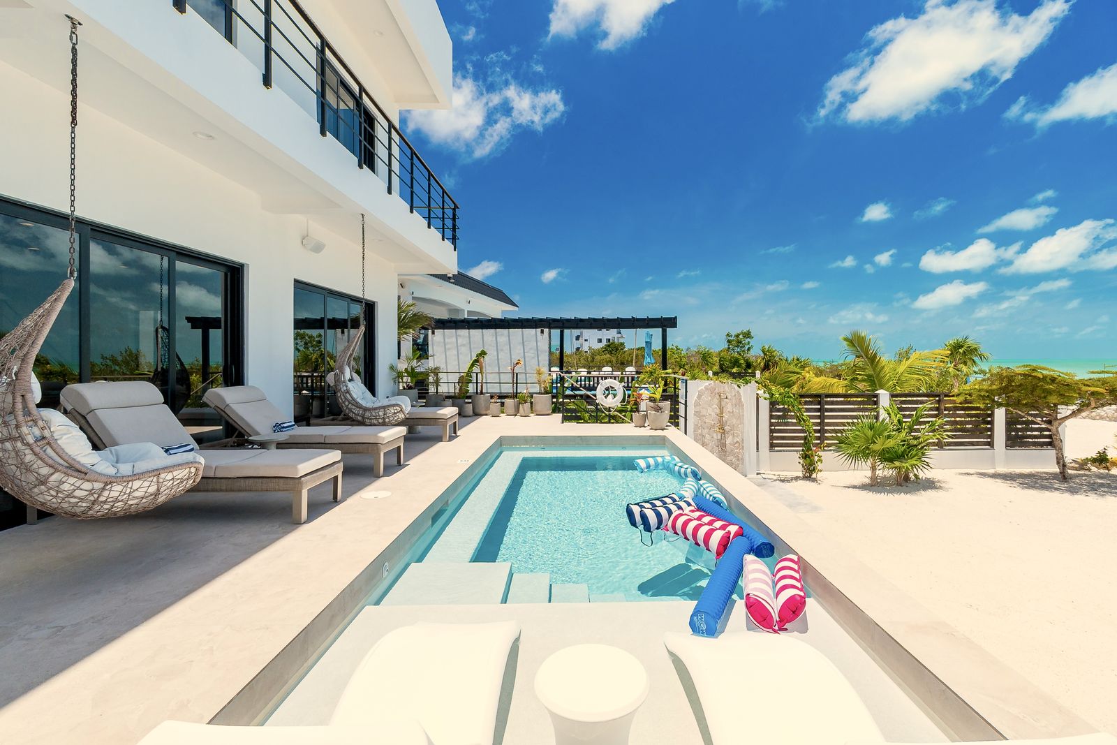 Pool floats and loungers on the pool deck