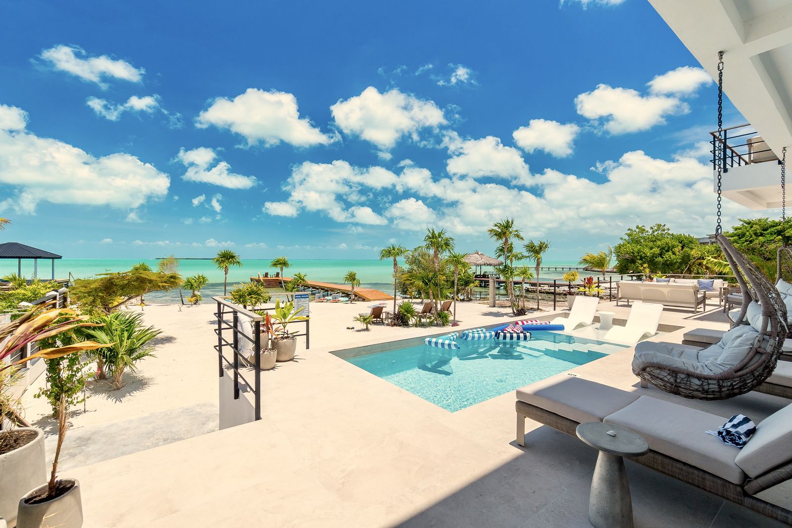 The saltwater pool and sun deck with the sea beyond